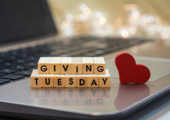 Giving Tuesday tiles on laptop