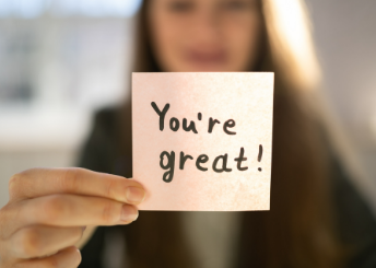 Sticky note reading 'You're great!'