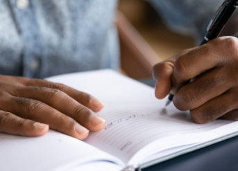 African American student writing essay