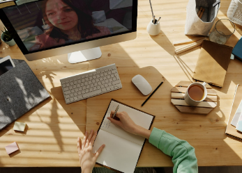 Overhead view of woman taking online class