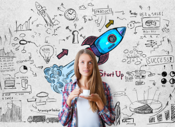Woman in front of a backdrop of entrepreneur concept drawing