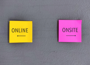 Post-it notes that read 'online' and 'onsite'