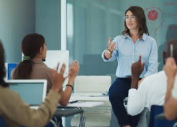 Female professor teaching class