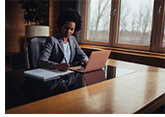 Woman Using Laptop